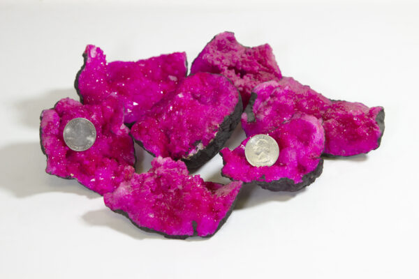 Large Opened Dyed Pink Geode with coins to show size