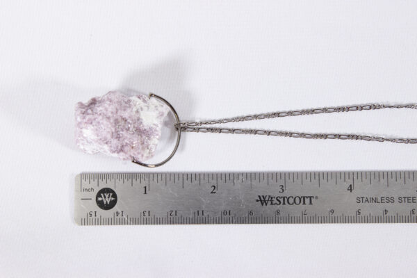 lepidolite necklace with ruler to scale