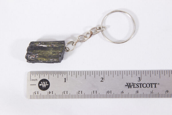 tourmaline keychain measured with ruler
