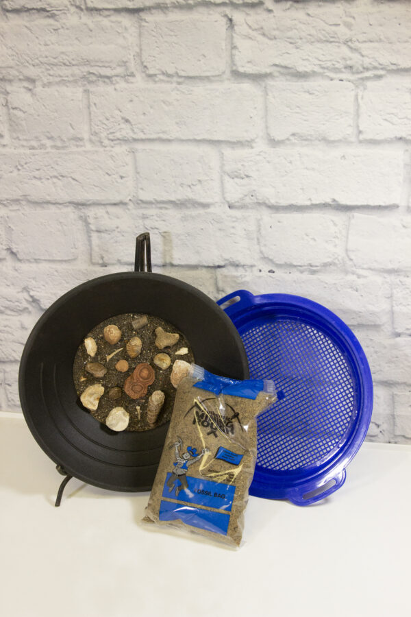 blue fossil bag with sifter