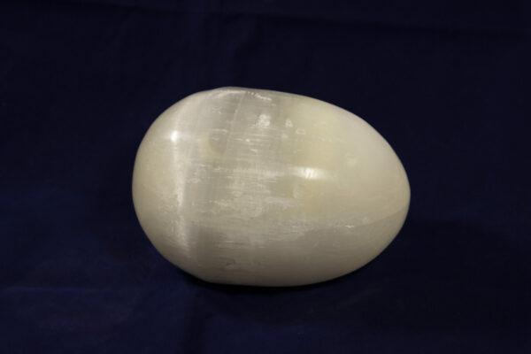 Large egg-shaped selenite stone