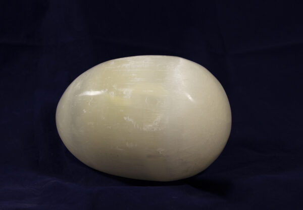 Large egg-shaped selenite stone