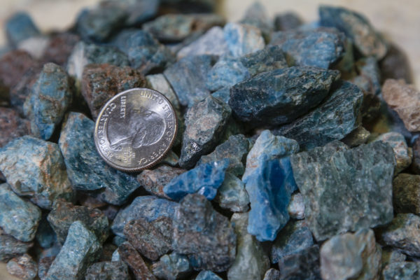 Pile of Blue Apatite Stones 1 pound with quarter for size