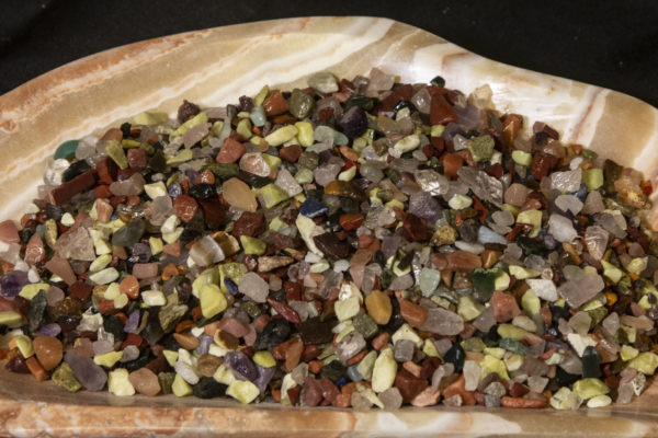 Natural Assorted Tumbled Stone Chips 1 half pound with quarter for size Natural Assorted Tumbled Stone Chips 1 half pound top view