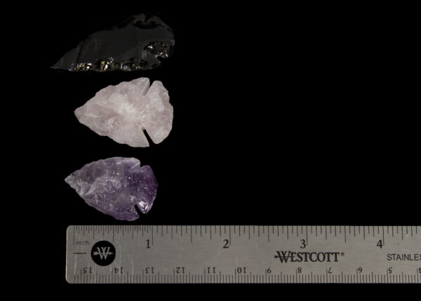 Amethyst, Rose, and Obsidian Arrowheads with ruler to show size