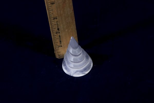 Mini Selenite Spiral Tower next to ruler to show size