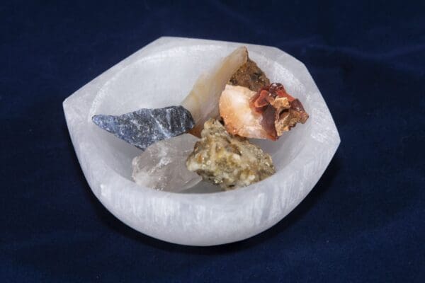 Selenite Bowl Charging Station with gems for display