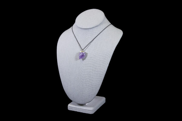 Rough Amethyst Pendant Necklace on display