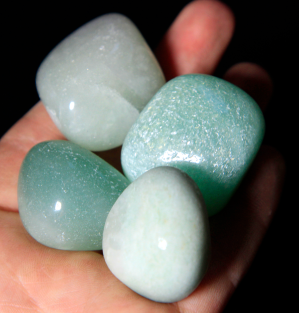 Medium Tumbled Green Aventurine Pieces in hand for size
