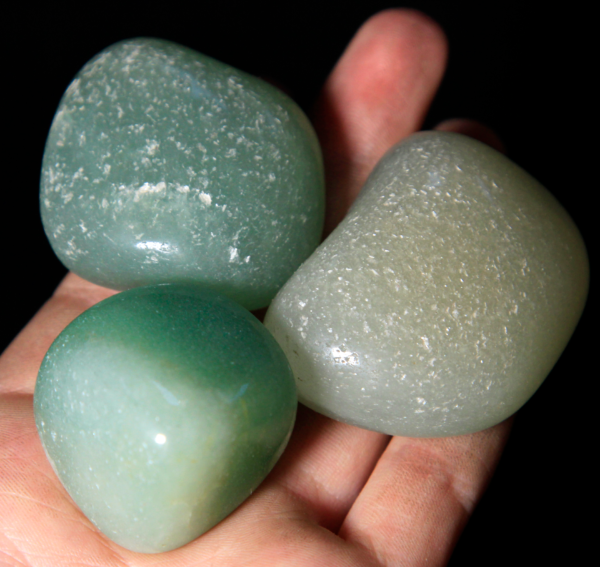 Large Tumbled Green Aventurine Pieces in hand for size