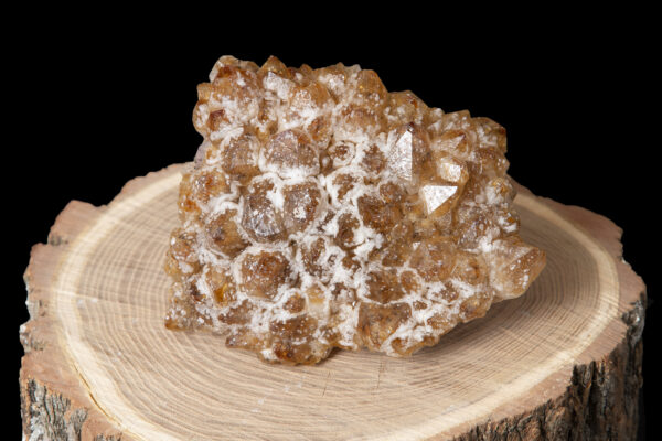 citrine with white inclusions on wood