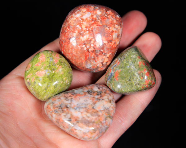Medium Tumbled Unakite Pieces in hand for size