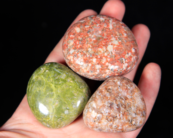 Large Tumbled Unakite Pieces in hand for size