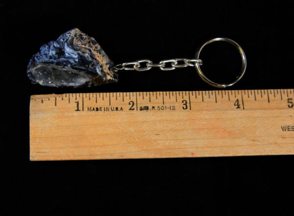 Blue Geode Keychain next to ruler for size comparison