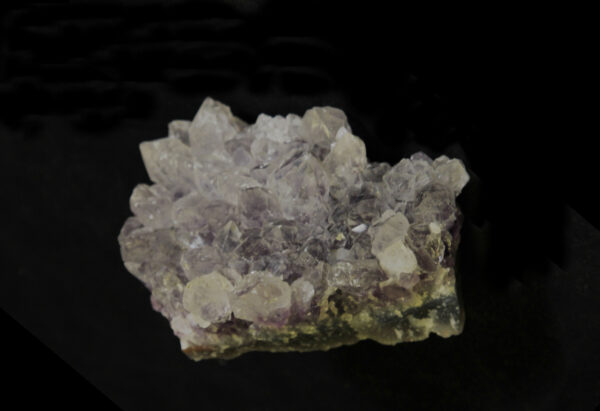 Purple Amethyst Crystal Cluster in green rock matrix