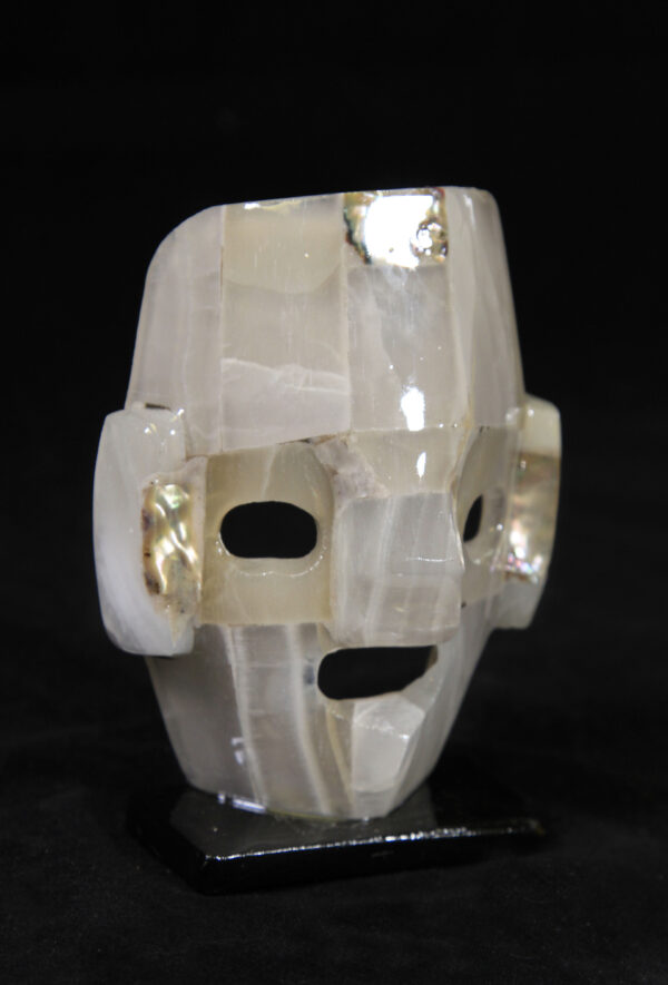 White decorative crystal mask on stand
