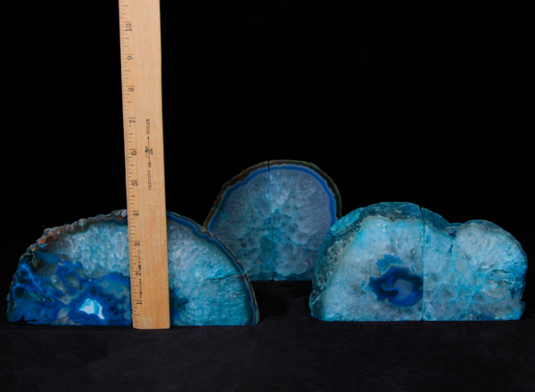 Three pairs of matching small teal Agate bookends next to ruler to show height
