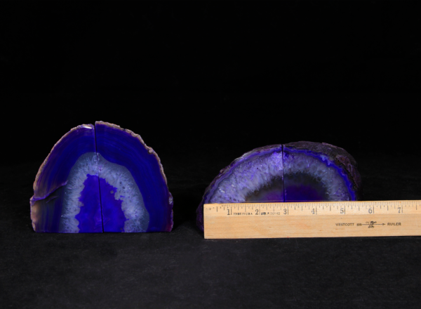 Two pairs of matching small purple Agate bookends next to ruler to show width