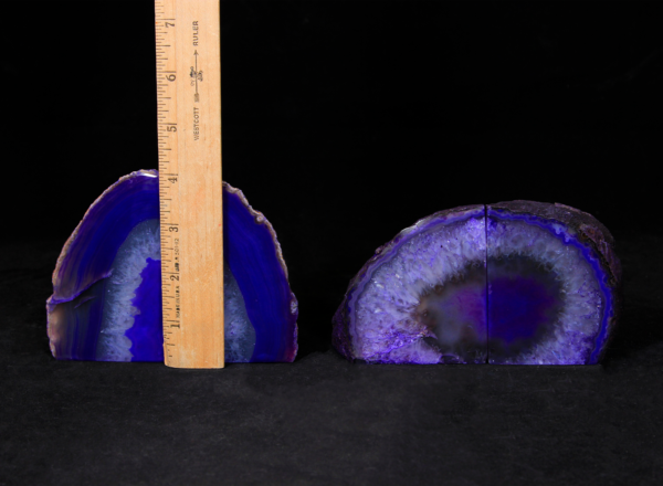 Two pairs of matching small purple Agate bookends next to ruler to show height