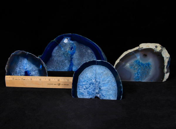 Four pairs of matching small blue Agate bookends next to ruler to show width