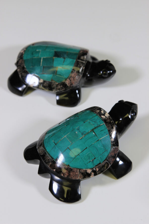 Two Obsidian turtle figurines with black and green shell