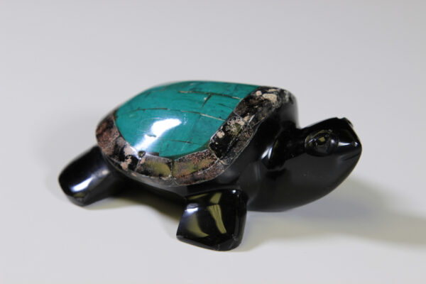 Obsidian turtle figurine with black and green shell