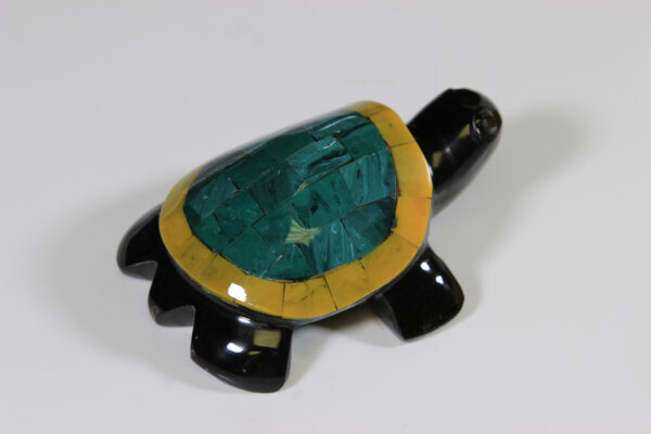 Obsidian turtle figurine with yellow and green shell