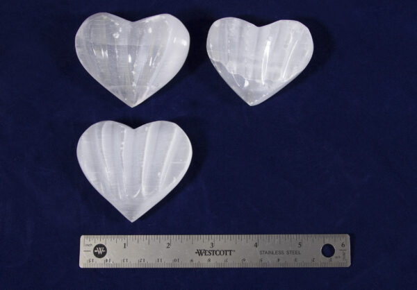 Selenite Massage Hearts with ruler for width