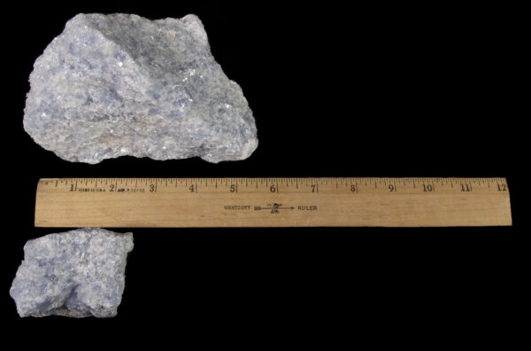 1 to 2 pound Blue Calcite pieces next to ruler for size comparison