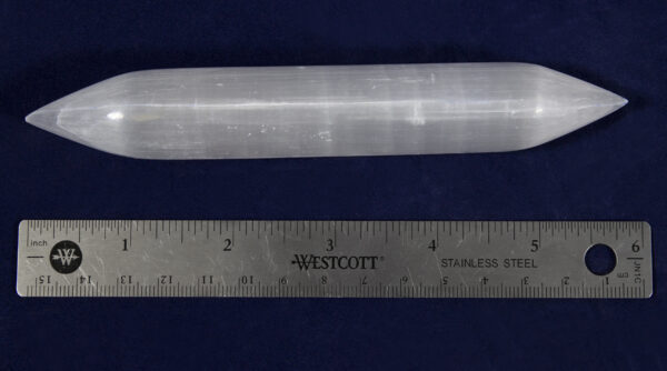 Double Sided Selenite Wand next to ruler to show width