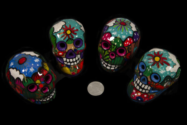 Day of the Dead Handpainted skulls with coin for size comparison