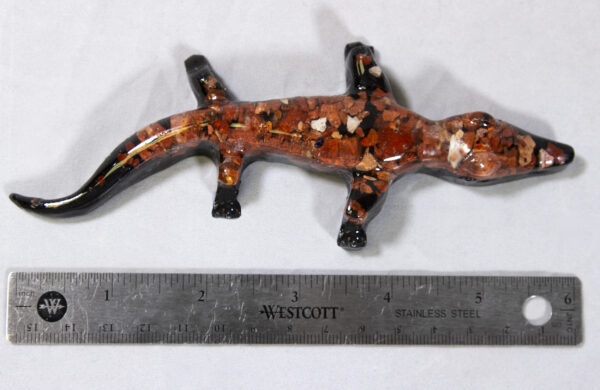 Red Precious Mineral Alligator Figurines next to ruler for size comparison