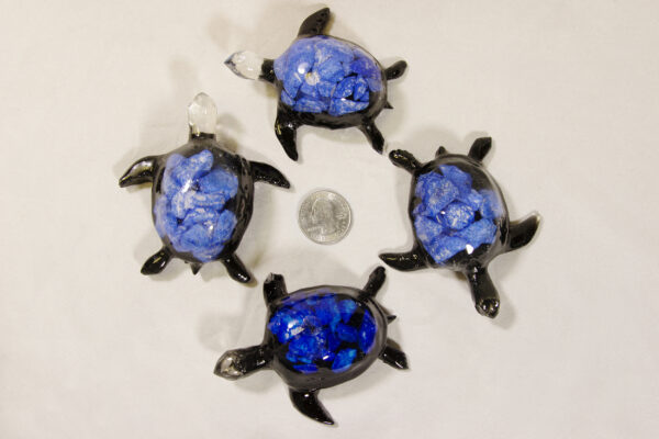 Large Blue Precious Mineral Turtle Figurines next to quarter for size comparison