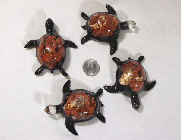 Large Red Precious Mineral Turtle Figurines next to quarter for size comparison
