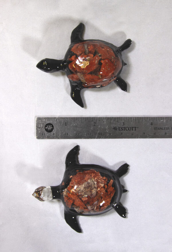 Large Red Precious Mineral Turtle Figurines next to ruler for size comparison