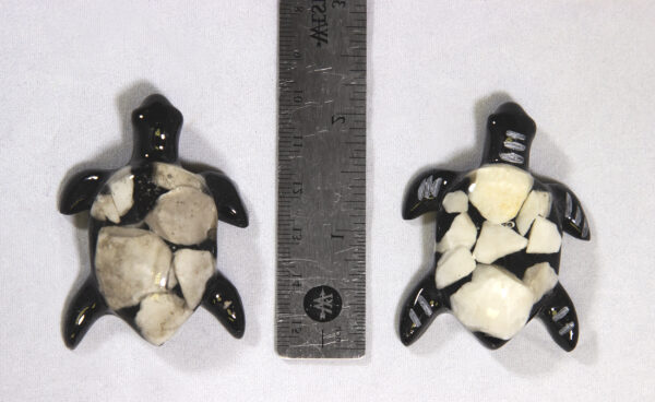 Small White Precious Mineral Turtle Figurines next to ruler for size comparison