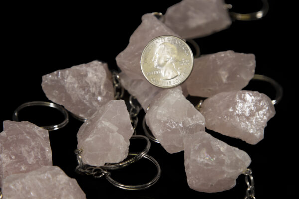 Rose colored Quartz Keychains with coin on top for size comparison