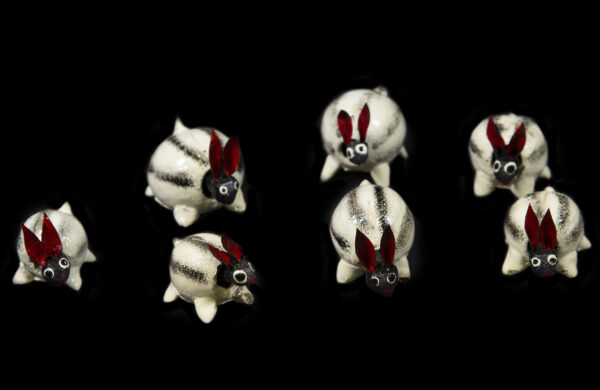 Set of several White Looseneck Rabbit Figurines top