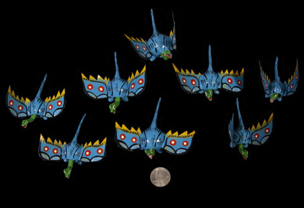 Set of several Blue Looseneck Dragon Figurines with quarter size comparison