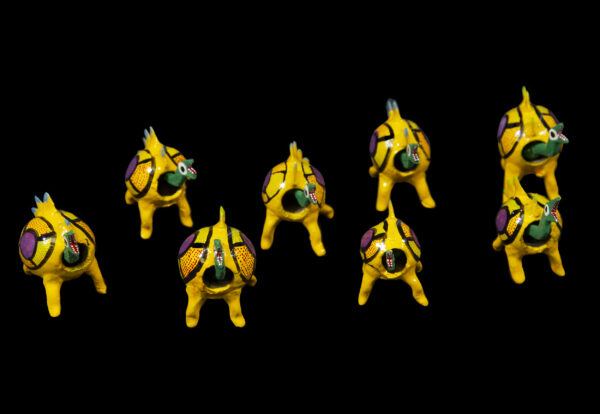 Set of several yellow looseneck dinosaur figurines