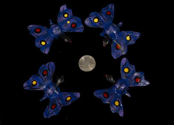Set of several Dark Blue Looseneck Butterfly Figurines with quarter size comparison