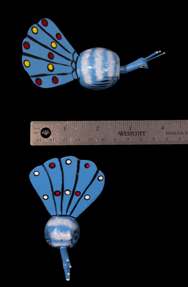 Blue Looseneck Peacock Figurines with ruler for size comparison