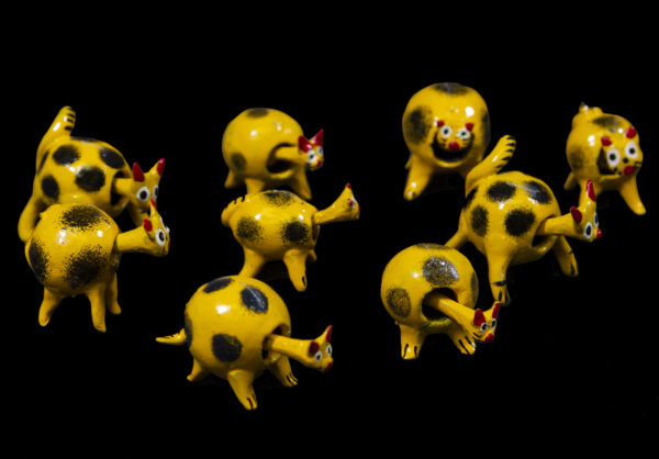 Yellow Looseneck Cat Figurines made from dried limoncello fruit