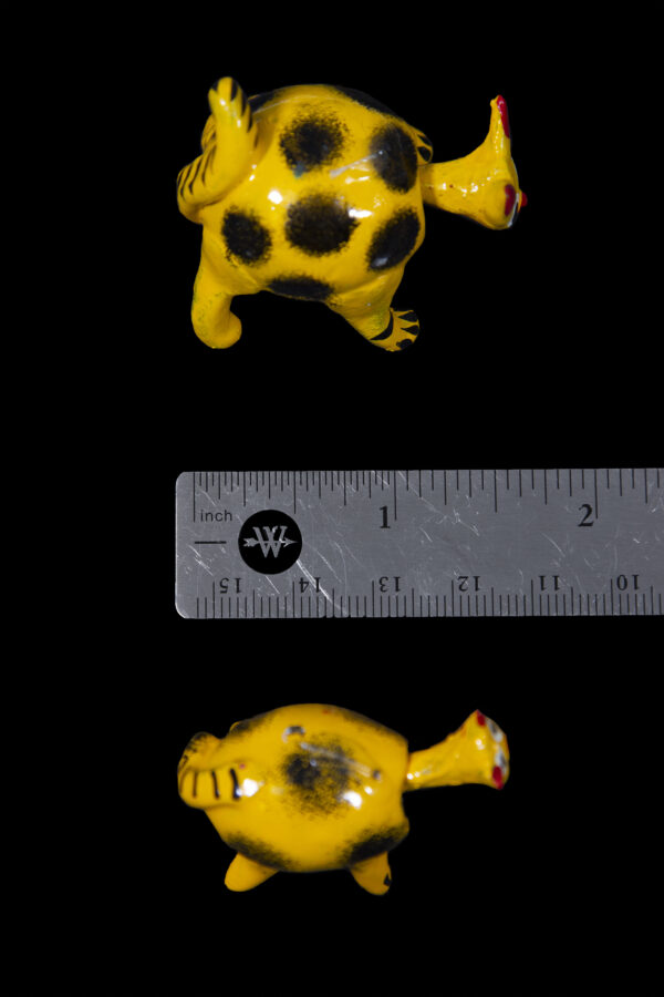 Yellow Looseneck Cat Figurines with ruler for size comparison