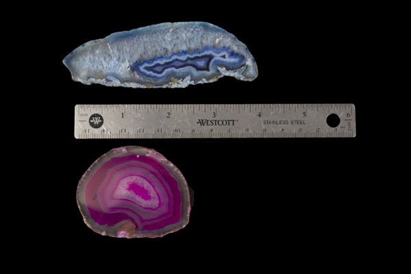 Two Crystal Agate Slices next to ruler for size comparison