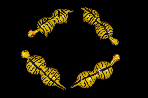 Yellow Looseneck Tiger Figurines arranged in circle