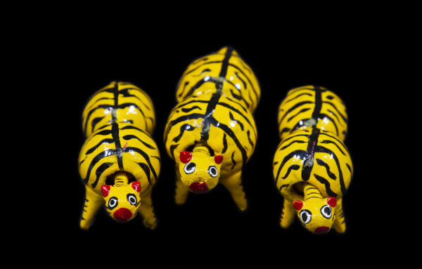 Set of several Yellow Looseneck Tiger Figurines made from dried limoncello fruit