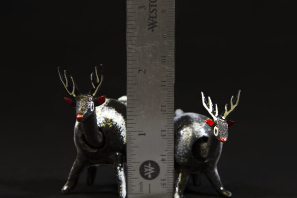 Two LooseNeck Deer Figurines next to ruler for size comparison