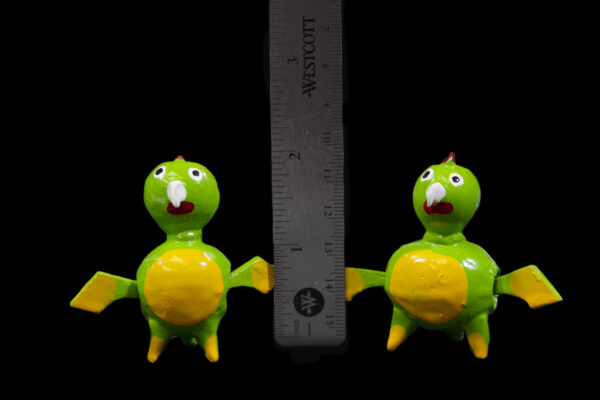 Two LooseNeck Parrot Figurines next to ruler for size comparison