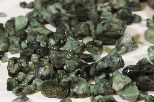 Pile of Medium Emerald Stones assorted close view